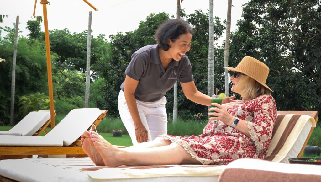 Concierge team member checking in with a patient after surgery